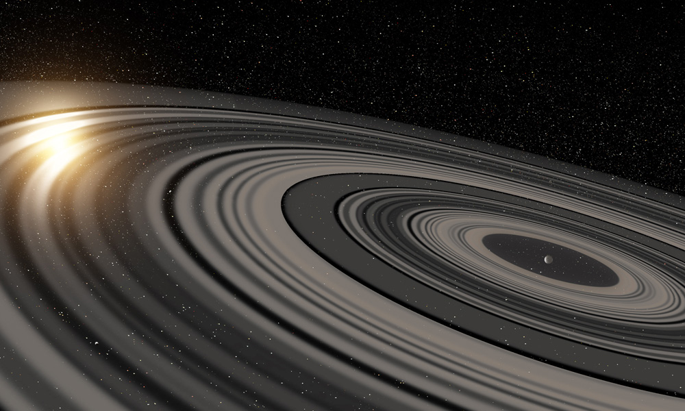 O incr�vel sistema de an�is descoberto ao cruzar � frente da estrela J1407 (Cr�dito: Ron Miller/Divulga��o)